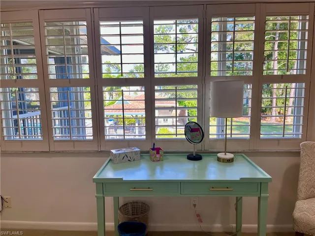 a kitchen with a sink and a window