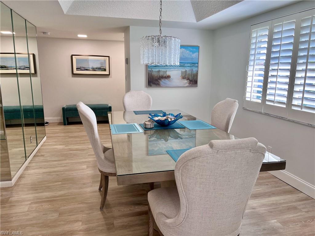 232 Memory Lane, Unit 4 Naples, FL 34112 - Photo 6 of 33 a dining room with furniture and window