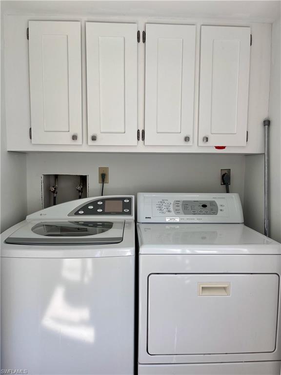 232 Memory Lane, Unit 4 Naples, FL 34112 - Photo 10 of 33 a close view of washer and dryer
