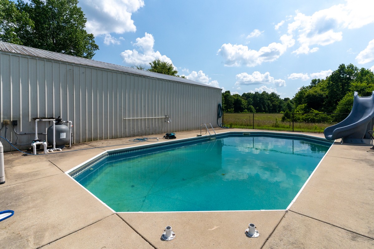 1301 Rogues Fork Road Bethpage, TN 37022 - Photo 36 of 51 a view of a swimming pool with a lounge chairs