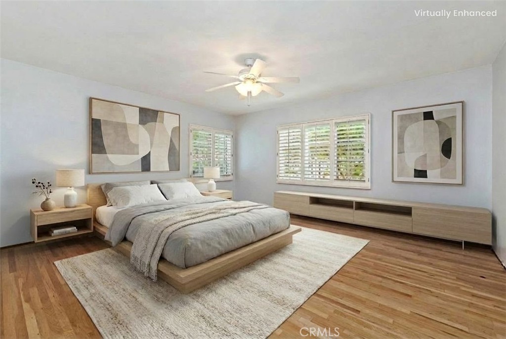 3630 Castle Reagh Place Riverside, CA 92506 - Photo 17 of 37 a bedroom with a large bed and a window