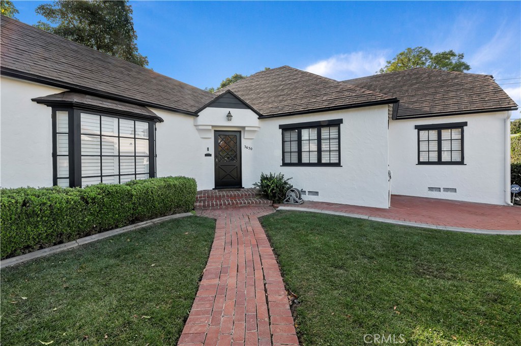 3630 Castle Reagh Place Riverside, CA 92506 - Photo 33 of 37 a front view of a house with a yard