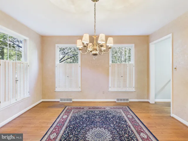 a view of a room with window and couch
