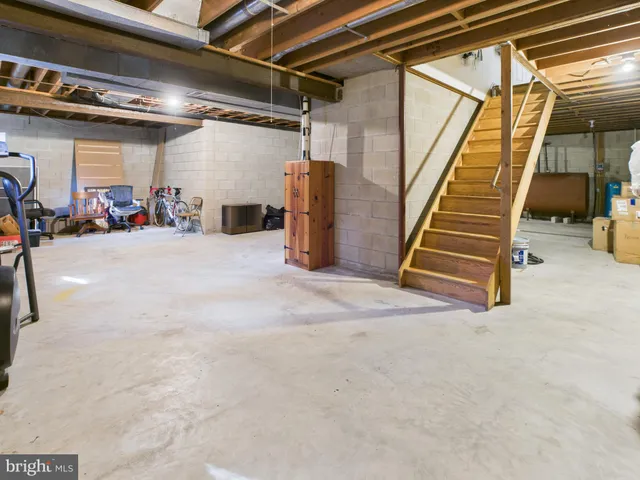 a view of a deck with chairs and wooden floor