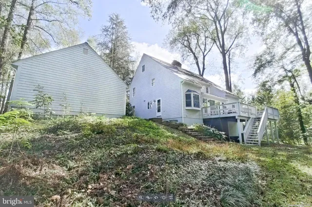 a view of a house with brick walls