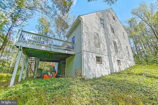 a view of lake with a yard