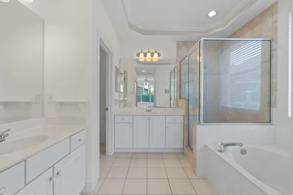 a bathroom with a bathtub and a sink