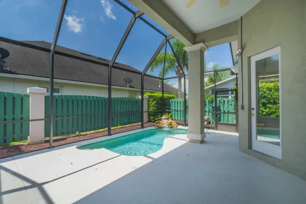 a house view with a sitting space and garden view