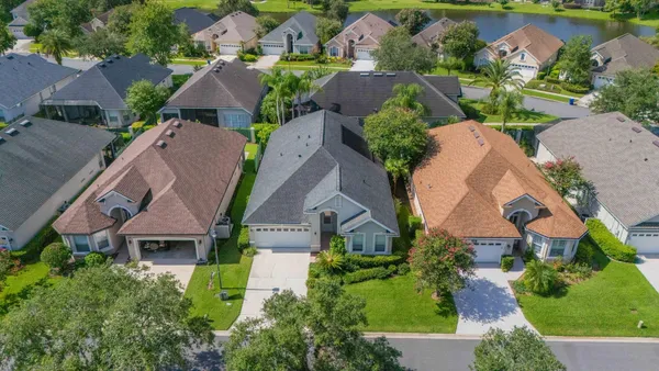 an aerial view of a house with a garden