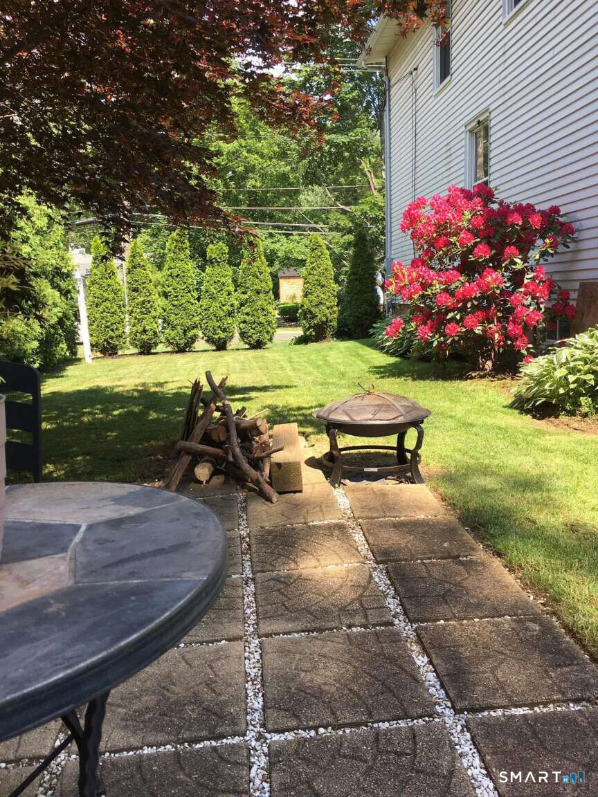 294 Church Street Guilford, CT 06437 - Photo 14 of 32 a view of backyard with wooden fence