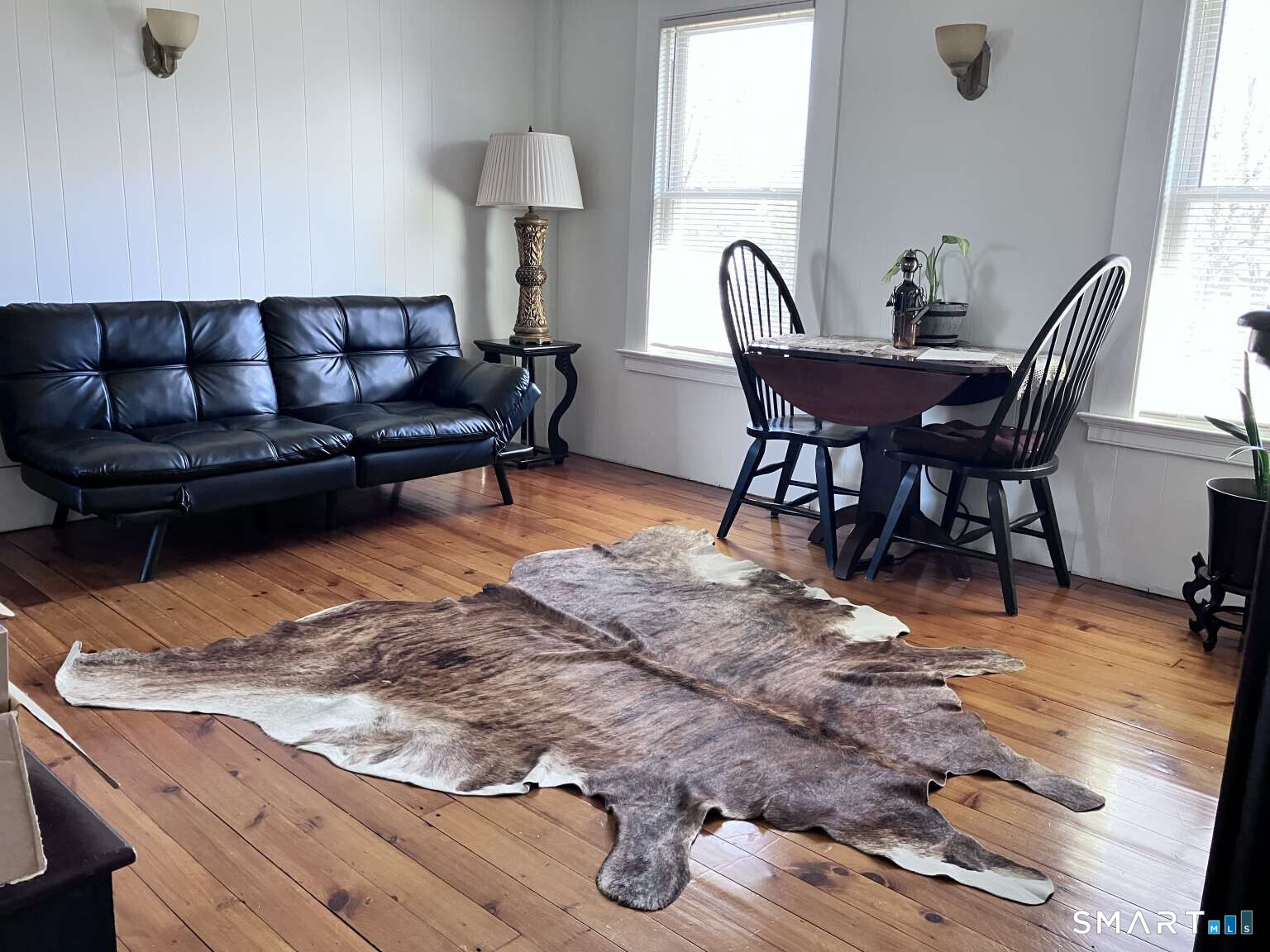 294 Church Street Guilford, CT 06437 - Photo 29 of 32 a living room with furniture and wooden floor