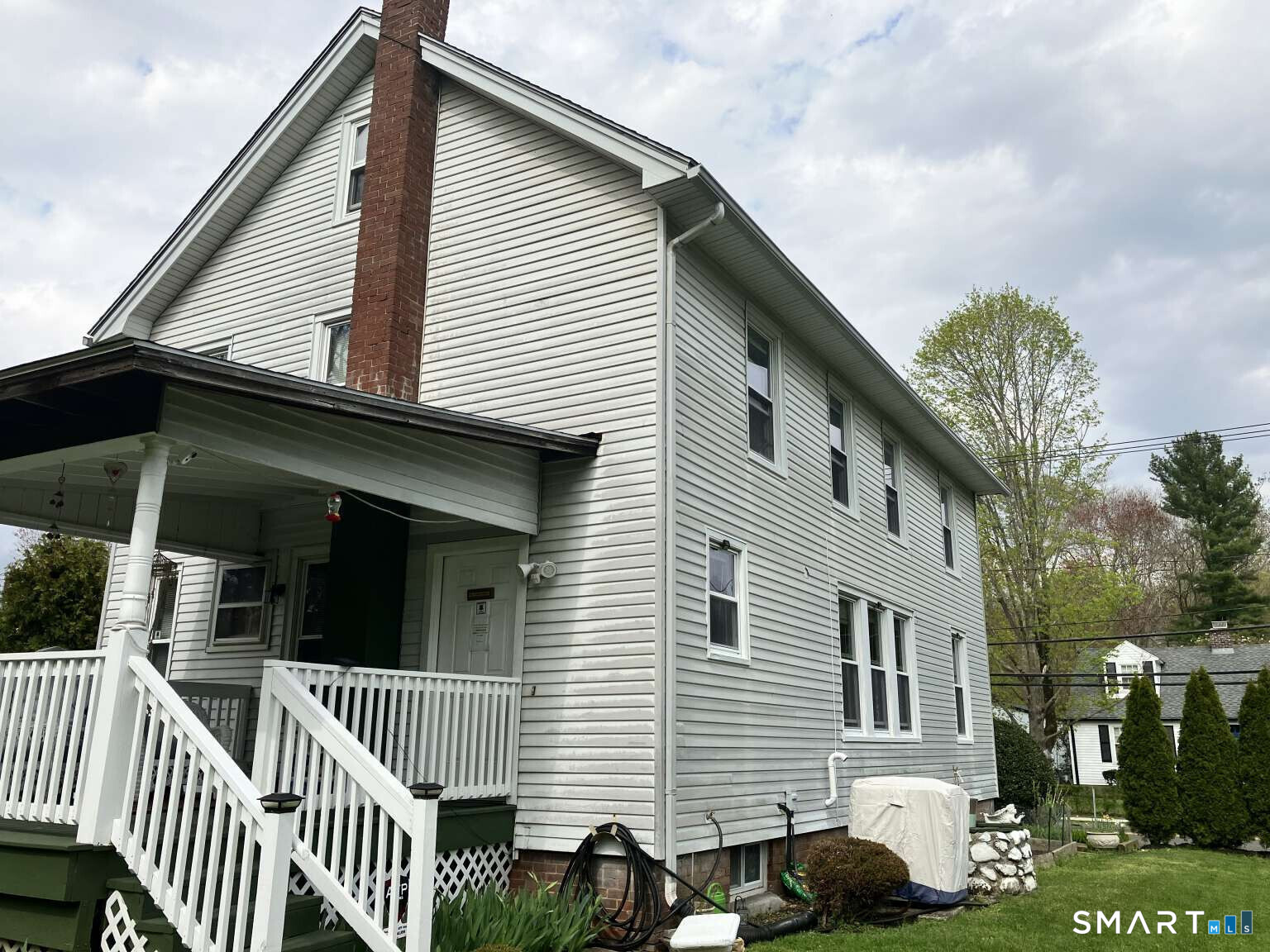 294 Church Street Guilford, CT 06437 - Photo 7 of 32 a view of a house with a yard