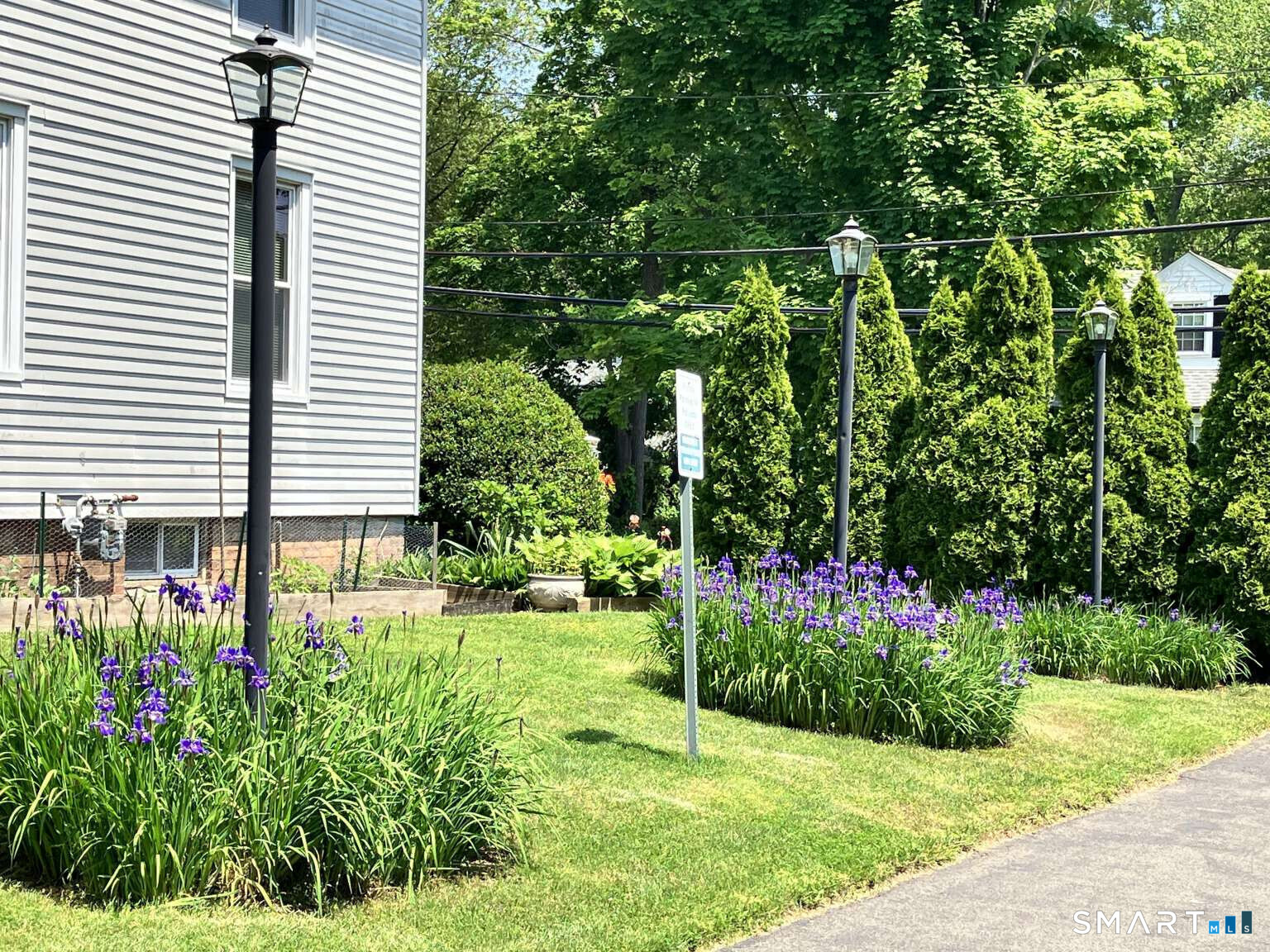 294 Church Street Guilford, CT 06437 - Photo 9 of 32 a view of a garden in front of a house