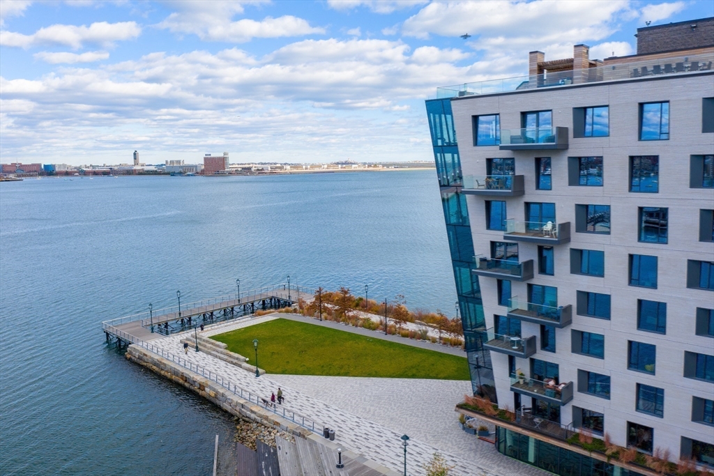 300 Pier 4 Blvd., Unit PHM Boston, MA 02210 - Photo 32 of 34 a view of a swimming pool and an ocean view