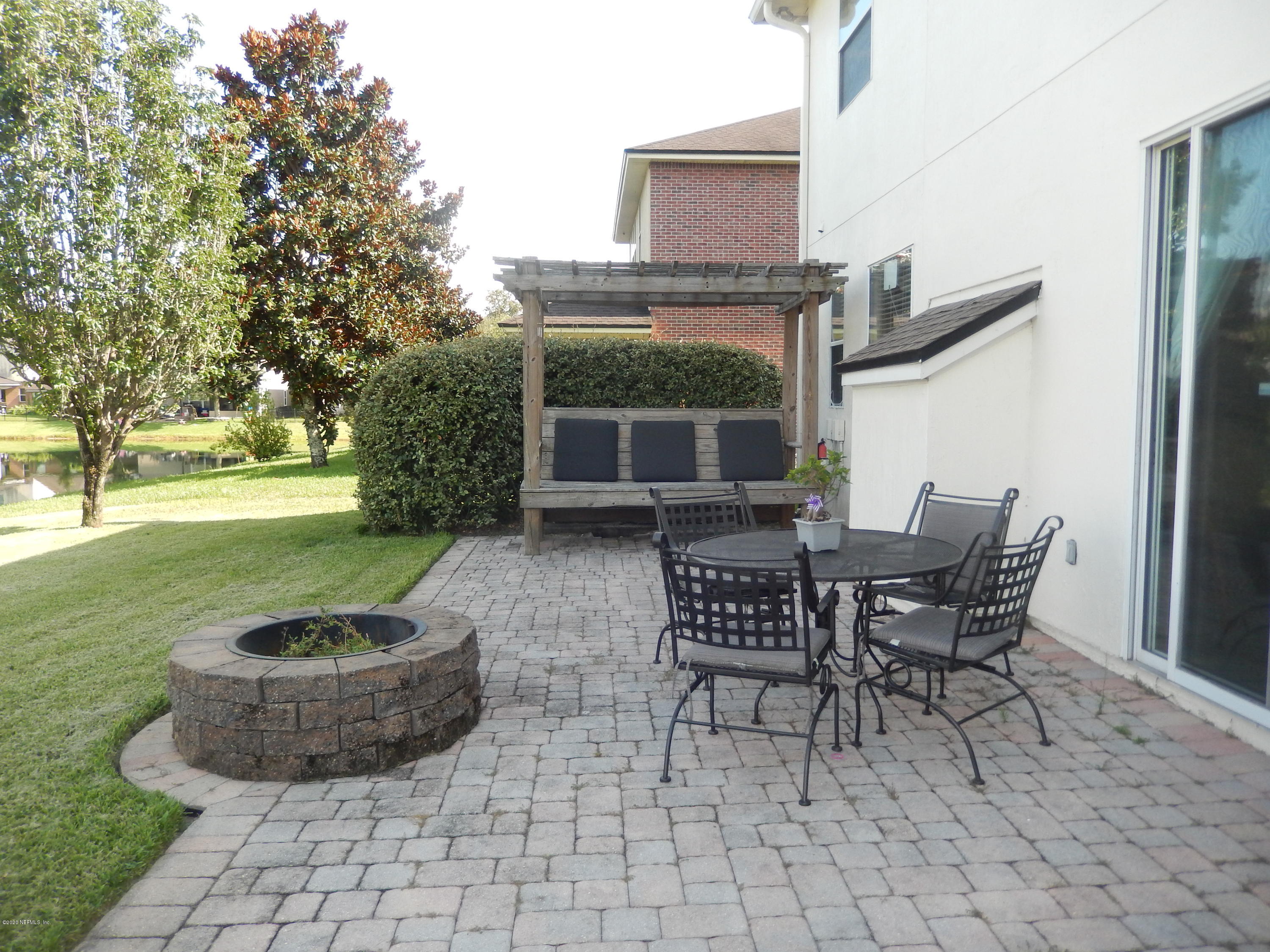 1482 Poplar Ridge Road Fleming Island, FL 32003 - Photo 3 of 19 paver/fire pit