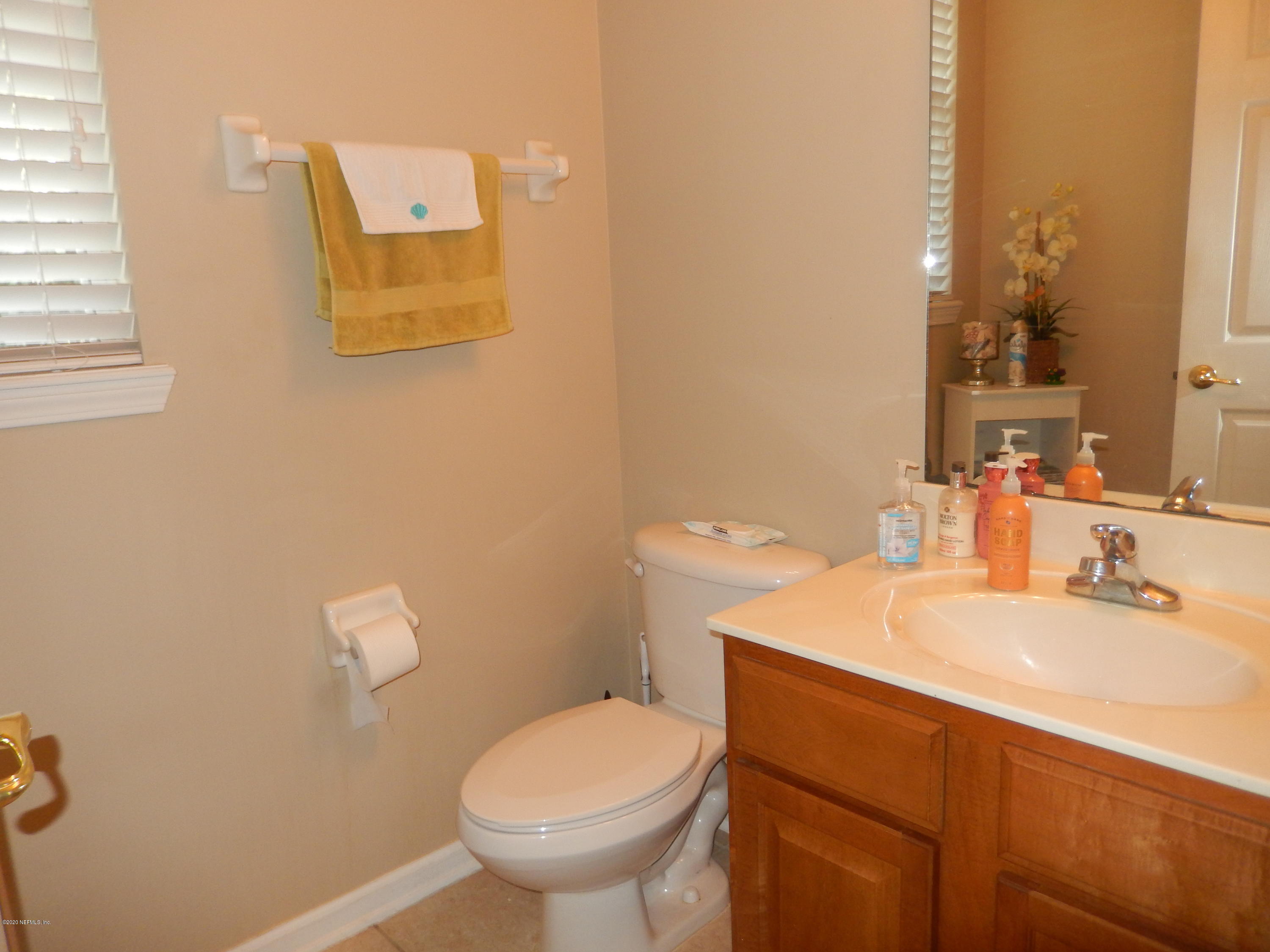 1482 Poplar Ridge Road Fleming Island, FL 32003 - Photo 9 of 19 half bath downstairs