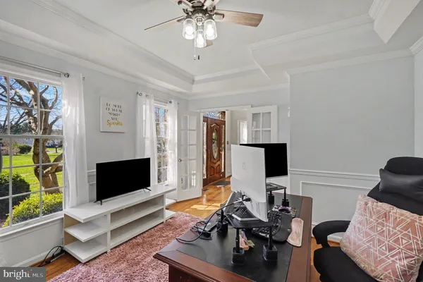 a view of a hallway with windows