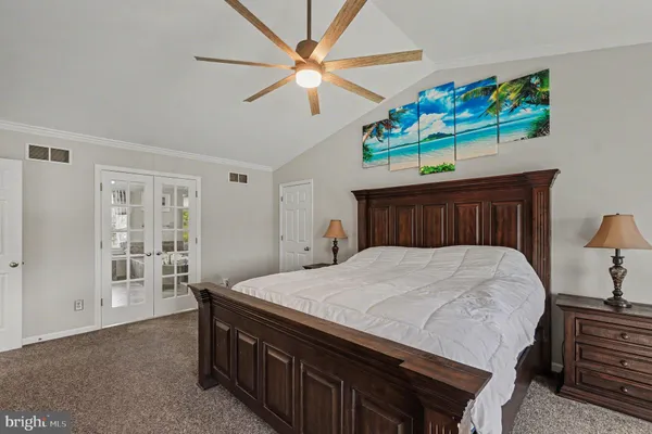 a bedroom with a bed and furniture