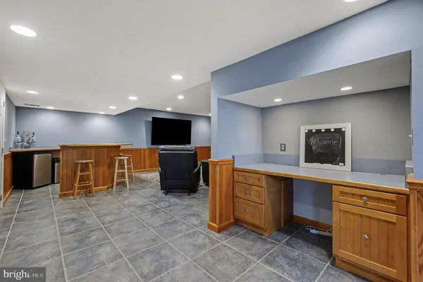 a view of a playground with basketball court