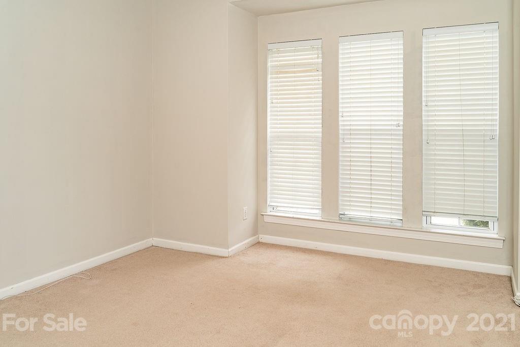 1032 Spanish Moss Road Indian Trail, NC 28079 - Photo 15 of 37 an empty room with a window