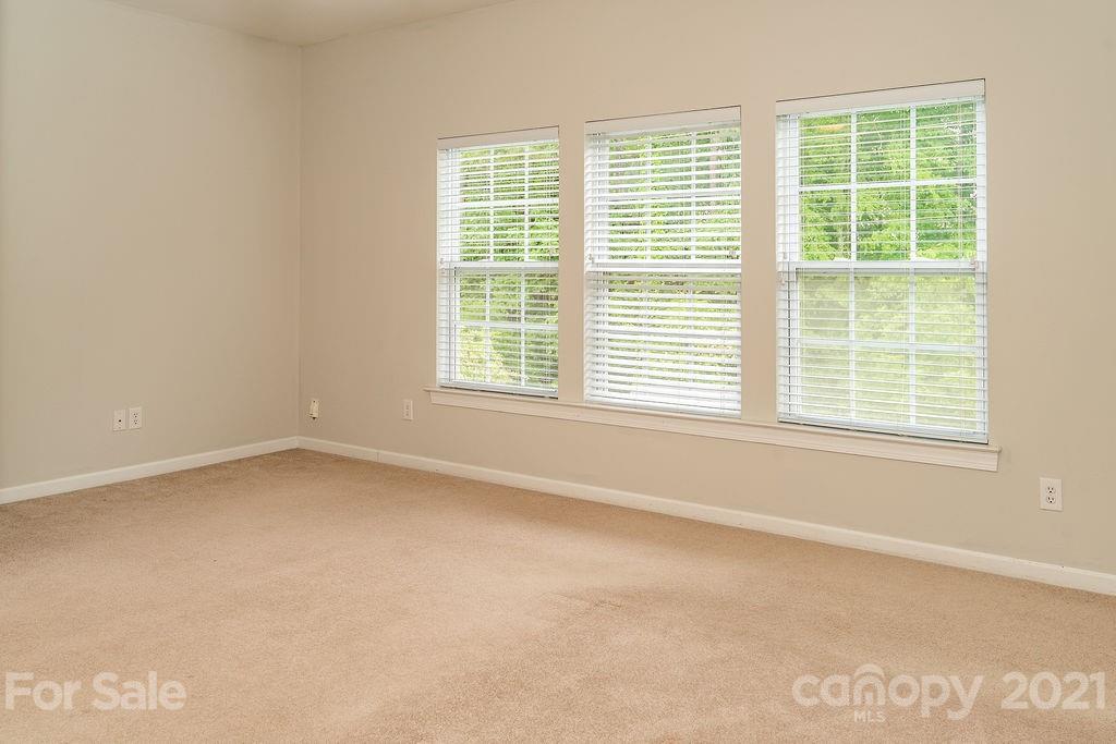 1032 Spanish Moss Road Indian Trail, NC 28079 - Photo 17 of 37 an empty room with a window