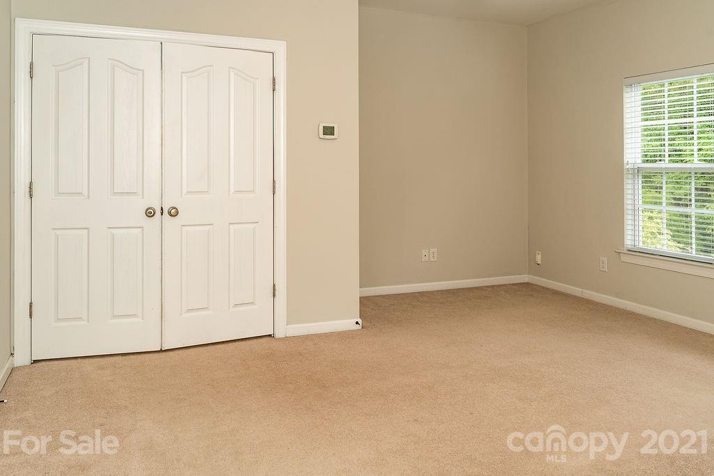 1032 Spanish Moss Road Indian Trail, NC 28079 - Photo 18 of 37 an empty room with windows