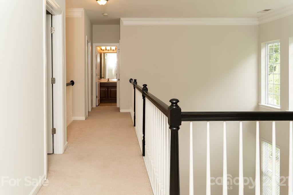 1032 Spanish Moss Road Indian Trail, NC 28079 - Photo 21 of 37 a view of a hallway with closet and a window