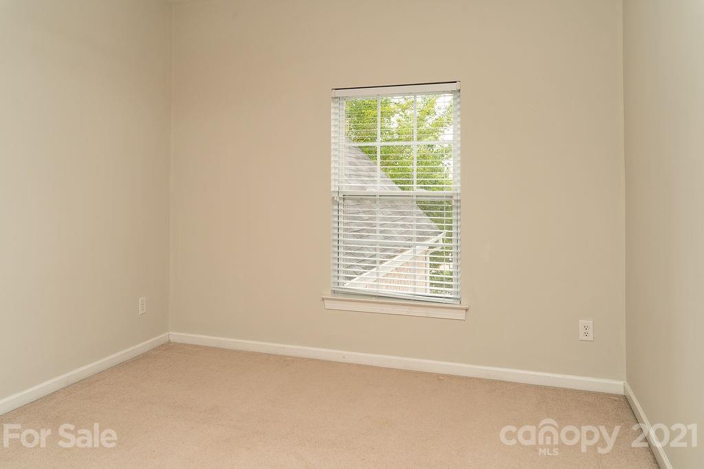 1032 Spanish Moss Road Indian Trail, NC 28079 - Photo 22 of 37 an empty room with a window