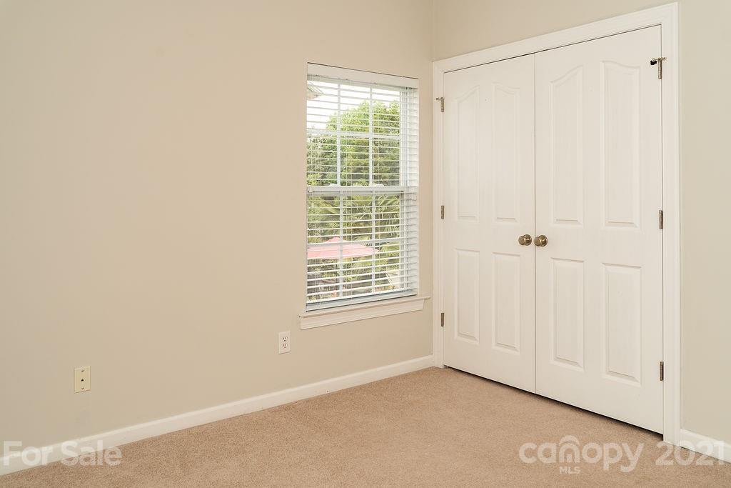 1032 Spanish Moss Road Indian Trail, NC 28079 - Photo 24 of 37 a view of an empty room with a window