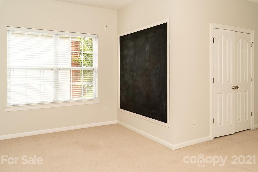 1032 Spanish Moss Road Indian Trail, NC 28079 - Photo 27 of 37 a view of an empty room with a window