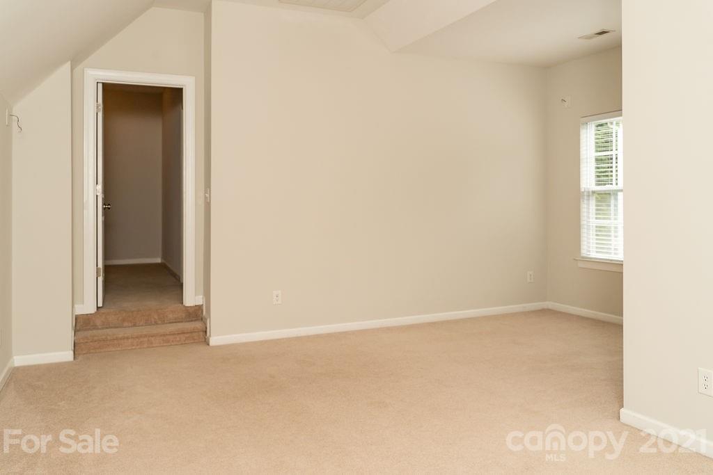 1032 Spanish Moss Road Indian Trail, NC 28079 - Photo 28 of 37 a view of an empty room and a window
