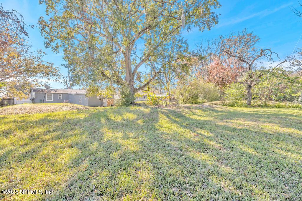 5352 Vick Avenue Jacksonville, FL 32254 - Photo 26 of 26 a view of swimming pool with an outdoor space and seating area