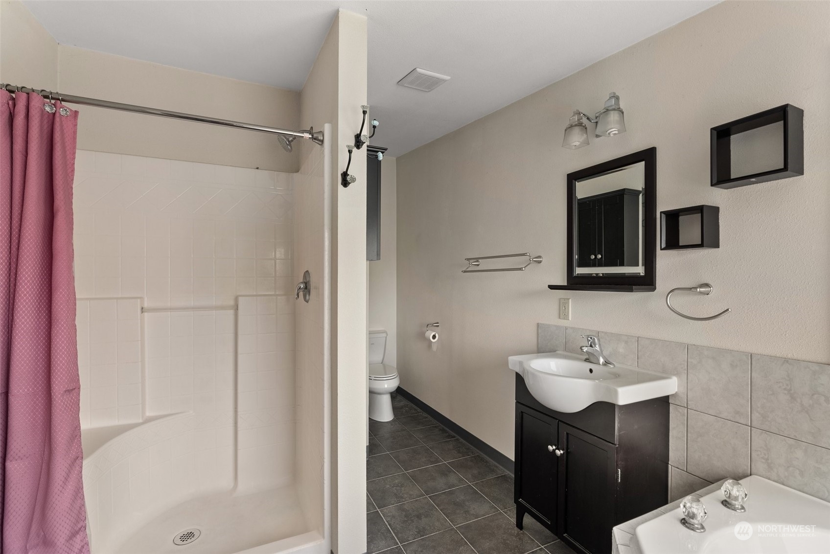 370 Manners Road Rochester, WA 98579 - Photo 18 of 34 a bathroom with a sink toilet and shower