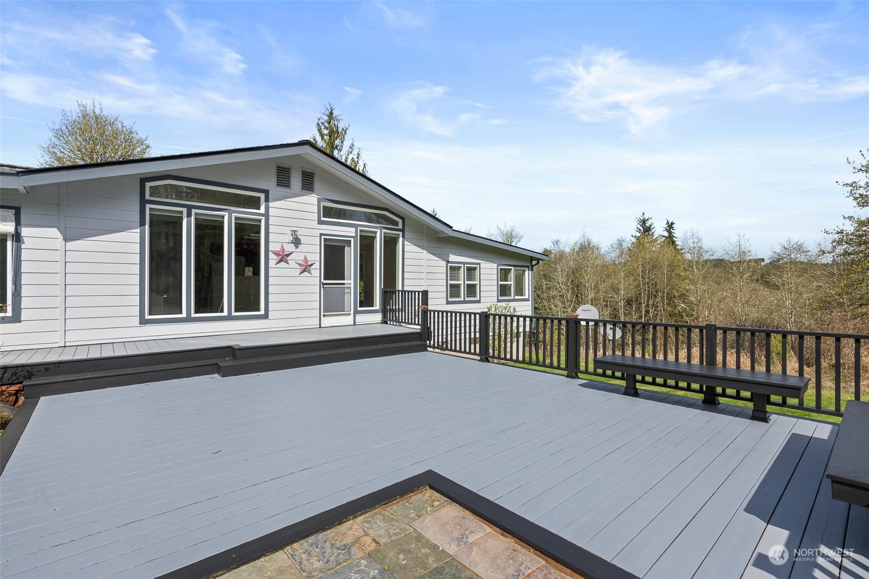 370 Manners Road Rochester, WA 98579 - Photo 26 of 34 a view of a house with a roof deck