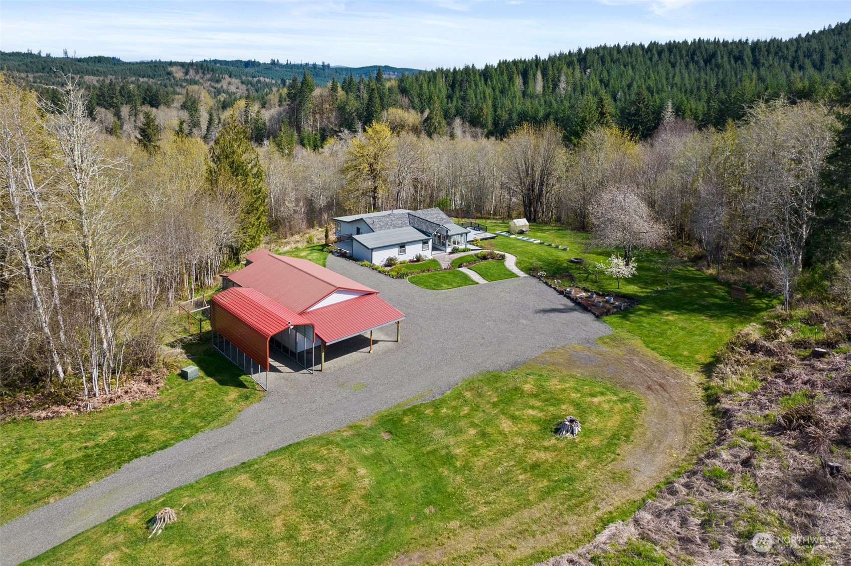 370 Manners Road Rochester, WA 98579 - Photo 5 of 34 a view of a lake with a yard