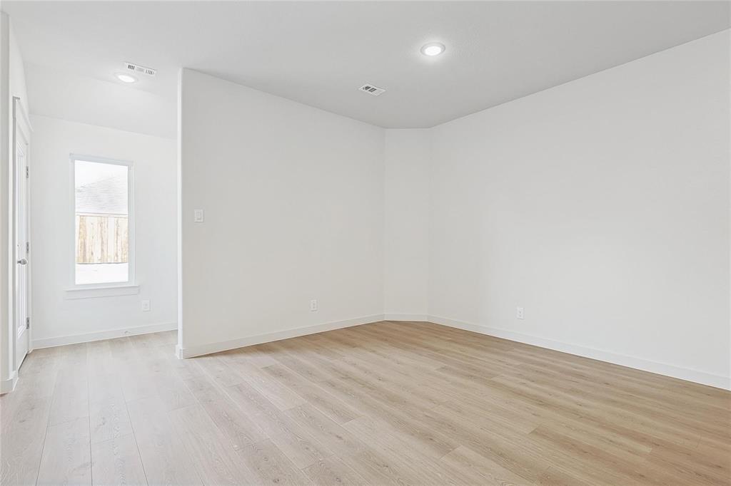 1759 Gleasondale Place Forney, TX 75126 - Photo 6 of 25 Spare room with light wood-type flooring and recessed lighting