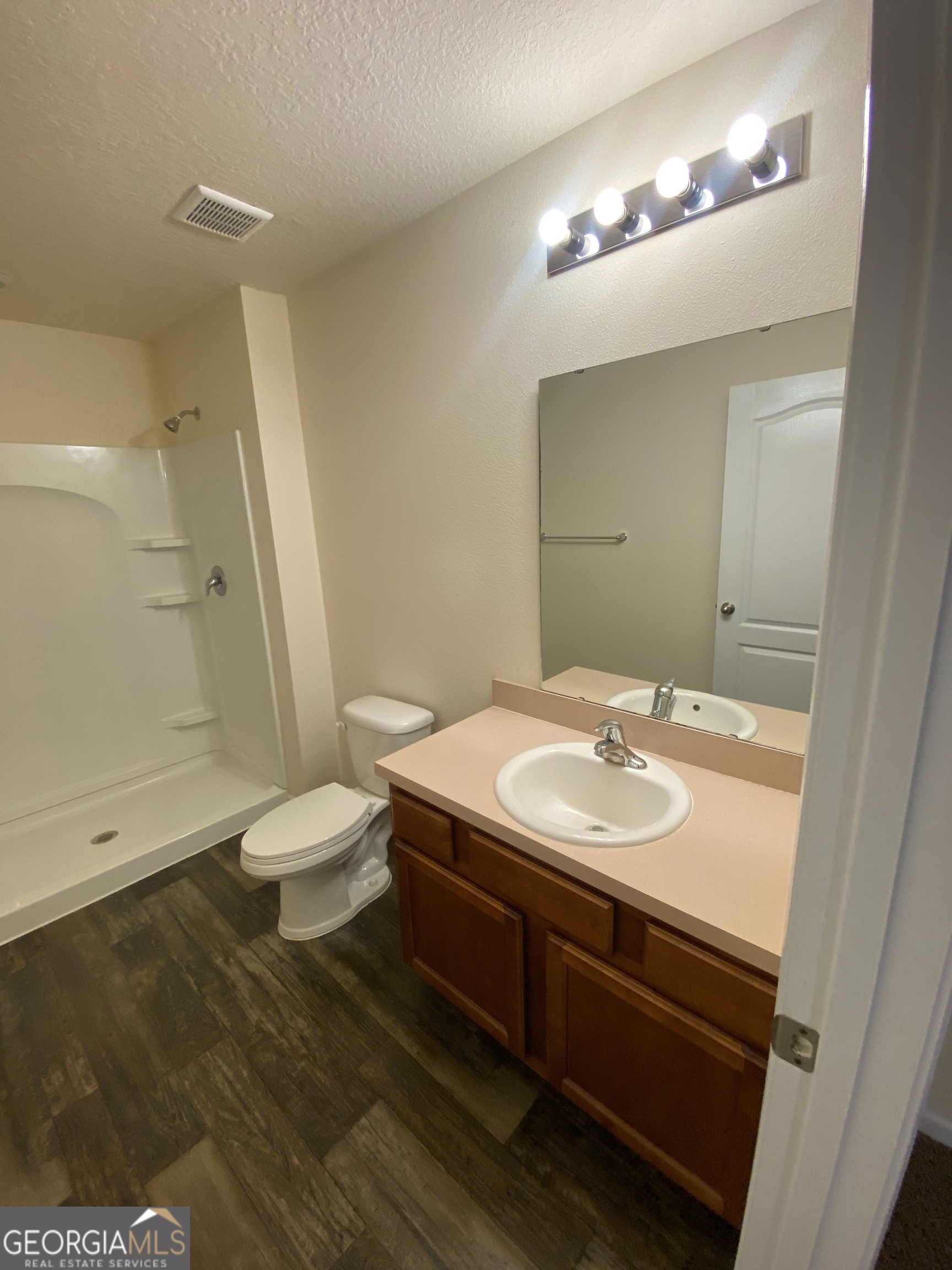 25 Fox Path St. Marys, GA 31558 - Photo 13 of 22 a bathroom with a sink and a mirror