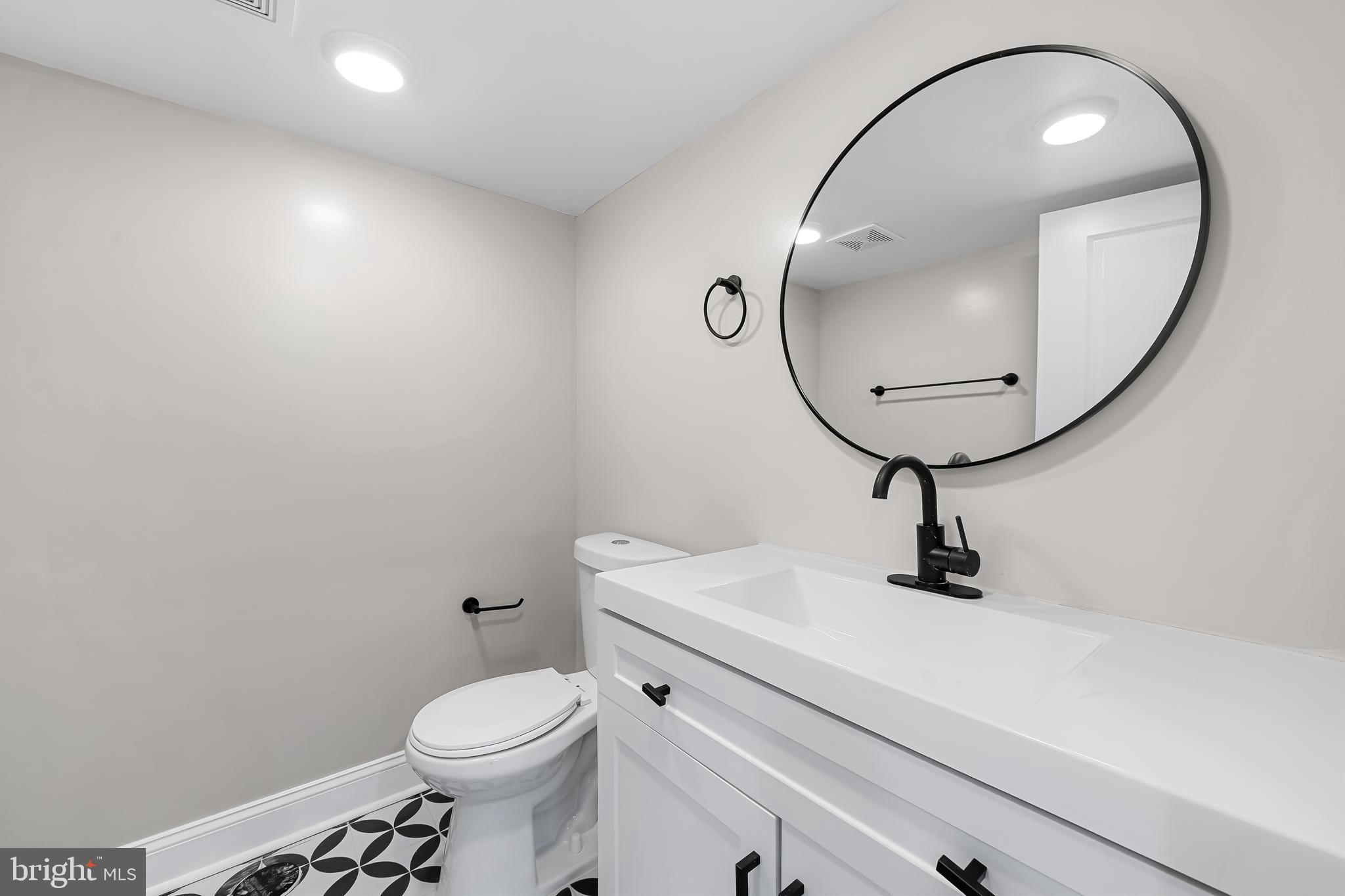 5503 Stuart Avenue Baltimore, MD 21215 - Photo 42 of 51 half bath basement