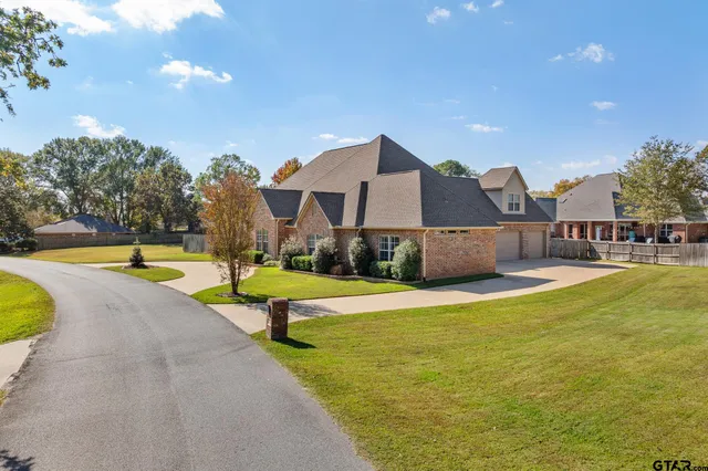 a view of a swimming pool with a lounge chairs