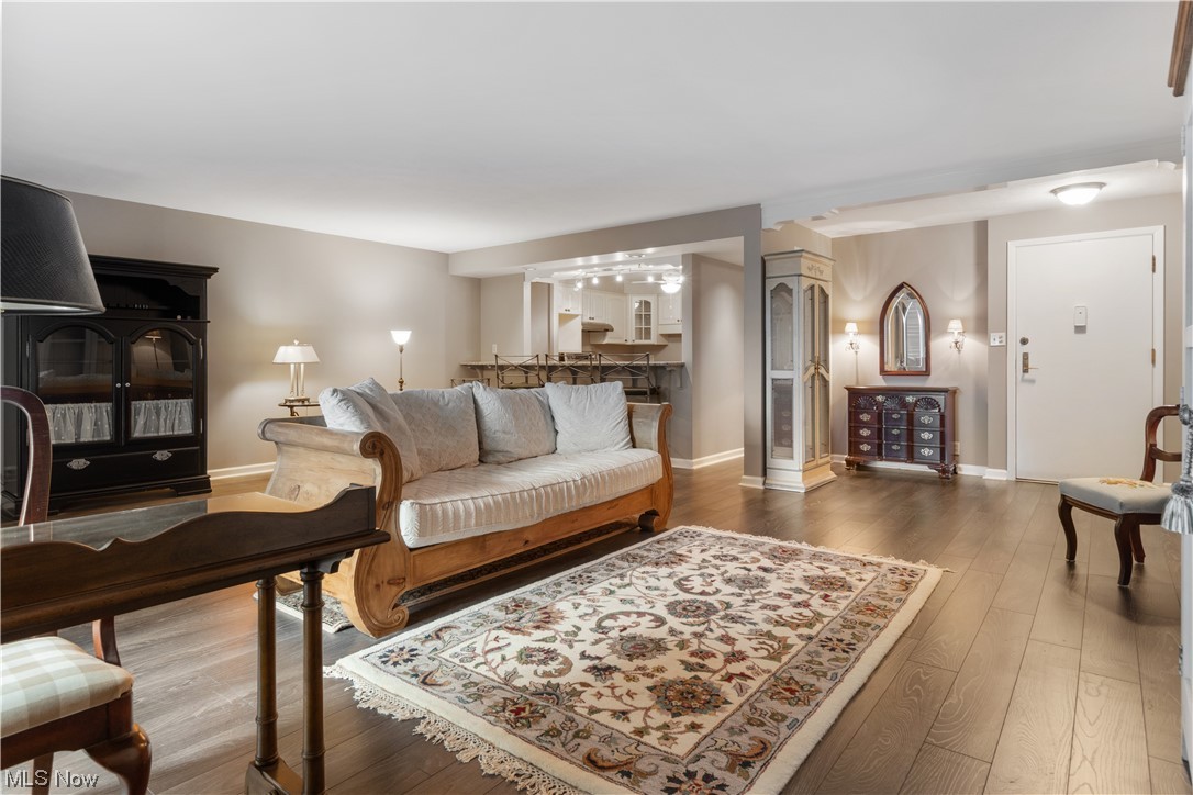 22555 Center Ridge Road, Unit 303 Rocky River, OH 44116 - Photo 15 of 33 Living room featuring light hardwood flooring