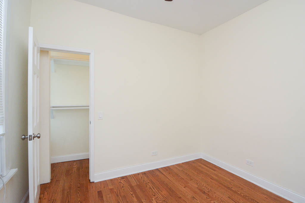 2347 West 24th Place, Unit 3R Chicago, IL 60608 - Photo 18 of 20 a view of a small space with wooden floor
