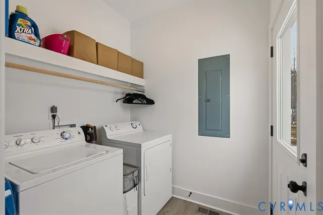 a large kitchen with a table chairs and a stove