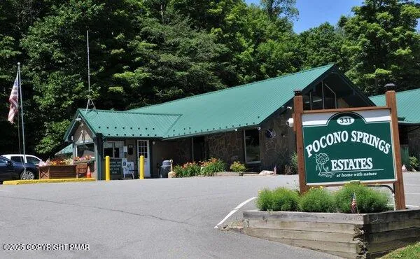 a view of outdoor space with a sign board