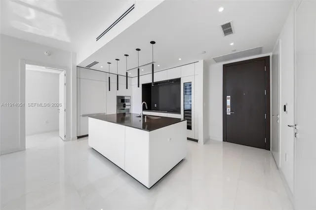 a bathroom with a shower and mirror
