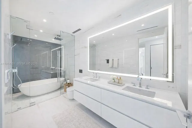 a view of a balcony with wooden fence