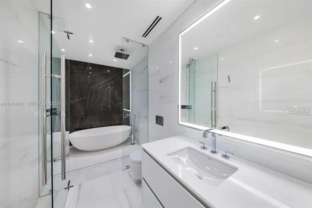 a close up of a white marble wall