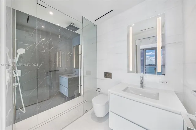 a media room with lots of chairs and a projector screen