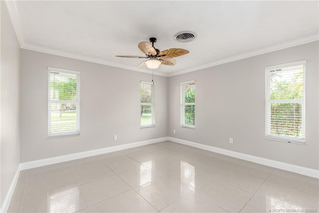 1469 Northwest Fork Road Stuart, FL 34994 - Photo 23 of 39 a view of an empty room with a window