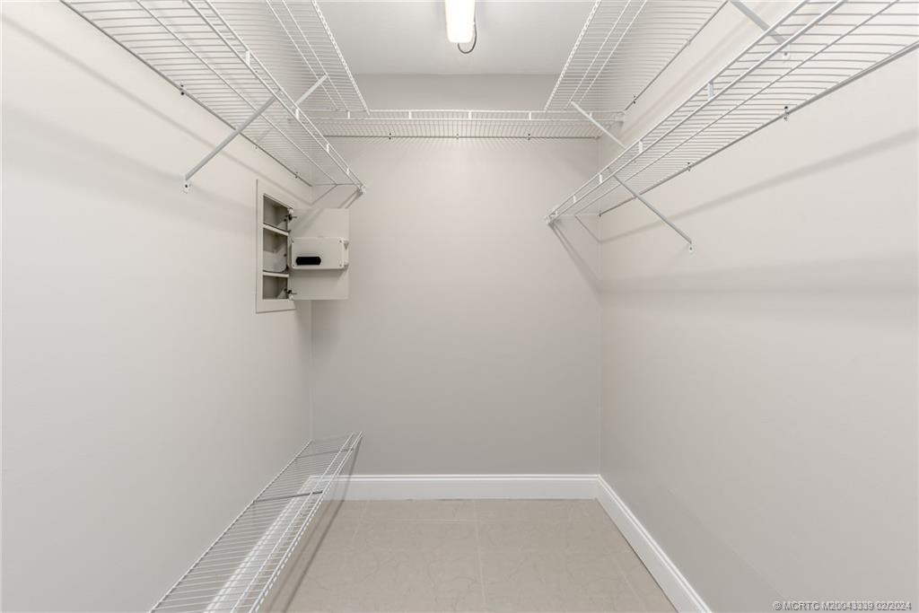 1469 Northwest Fork Road Stuart, FL 34994 - Photo 24 of 39 a view of a room with racks on the wall