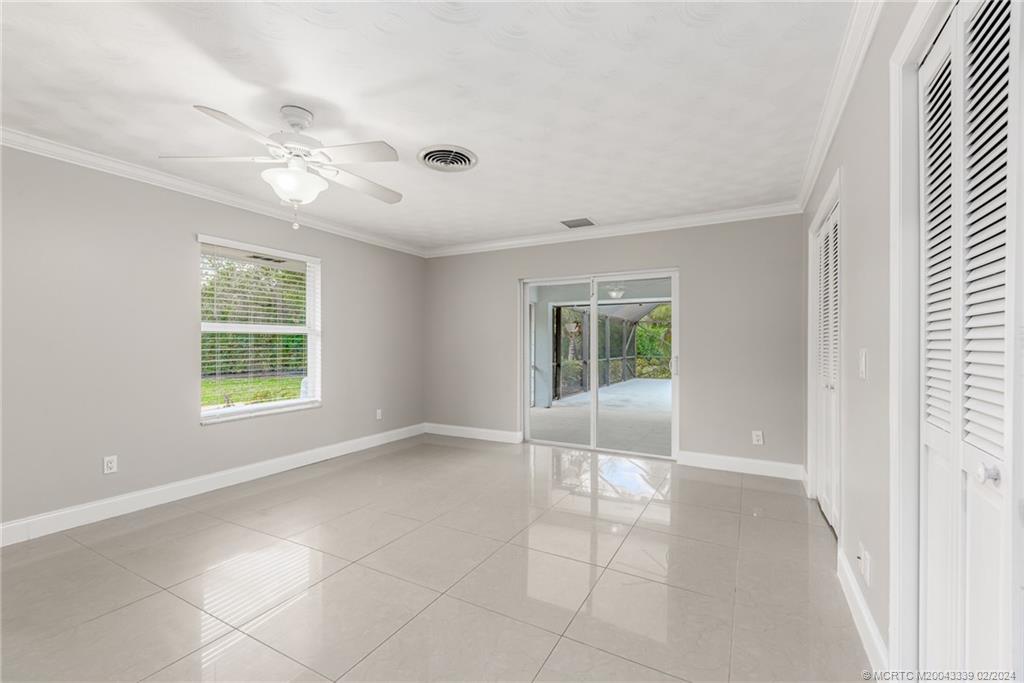 1469 Northwest Fork Road Stuart, FL 34994 - Photo 25 of 39 a view of an empty room with a window